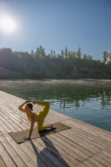 Engaging in a morning yoga practice by the beautiful lakeside can be incredibly revitalizing