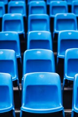 Fototapeta premium Inside the stadium, the blue bleachers are empty