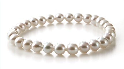 Obraz premium A stunning circle of pearls forming a delicate trail on a white background, showcasing their soft luster and timeless elegance
