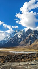 Amazing landscape of a vast mountain area with breathtaking views of towering peaks, rolling hills, and serene natural beauty. Perfect for nature photography, outdoor adventure concepts, 