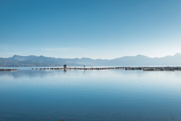 A calm blue lake in the mountains.
