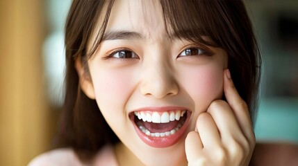 A Chinese woman in her late 20s wincing in sharp pain after sipping a cold drink, her hand pressed against her cheek as she feels the sudden discomfort from sensitive teeth