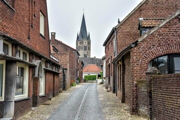 Street in Thorn with a view of the Abbey Church.
Thorn, Limburg, Holland, Netherlands, Europe.
