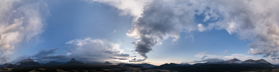 Panoramic View of Majestic Canadian Rockies and Dramatic Sky in Alberta, Canada