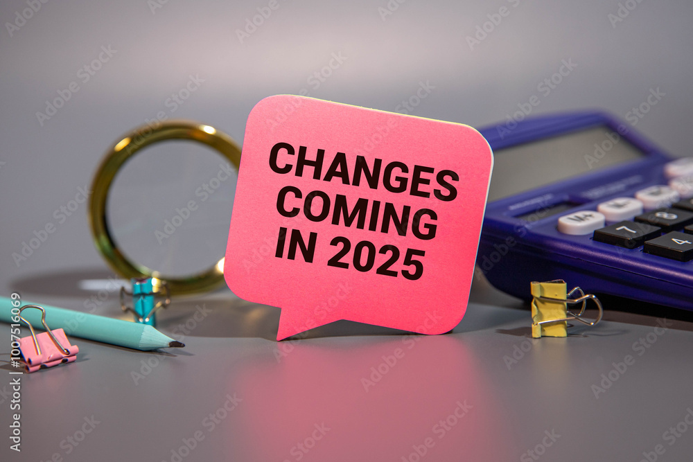 Poster changes coming in 2025 text on notepad concept background
