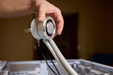 The process of properly installing a CPU cooler water cooling in a custom built personal computer system