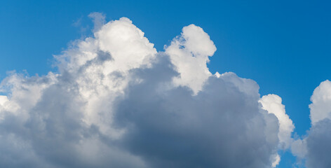 Beautiful view of blue sky with clouds at sunrise. Sky clouds background. Partly cloudy. Background cloud summer. Sky cloud clear with sunset. Natural sky