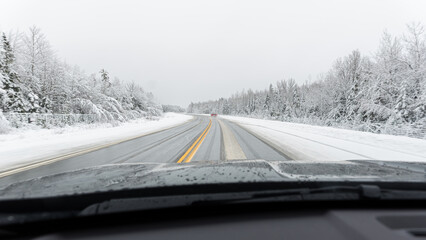 Driving on icy highway after a snowstorm
