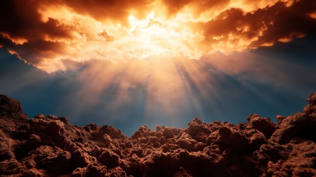 A dramatic sky is showcased with the sun's rays piercing through thick cloud cover, casting radiant light upon a rugged, rocky terranean landscape below.