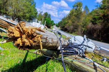 Strong hurricane caused poles to crash down with broken wires during storm
