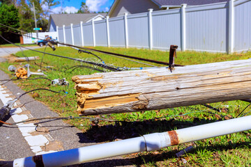 In course of storm violent hurricane, strong winds caused electricity poles to crash down with...