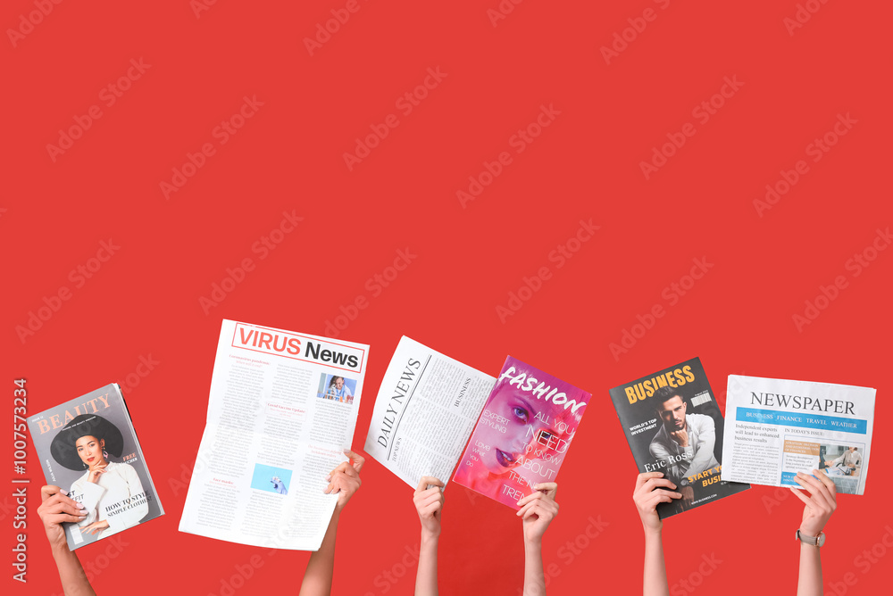 Poster Female hands with different magazines and newspapers on red background