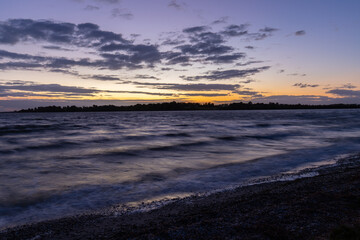  Serene Twilight at the Shoreline with Distant Sunset, Raymond Island, Australia