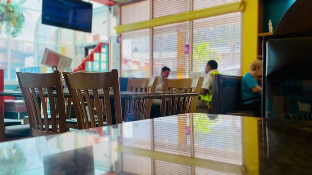 A hotel restaurant scene over a morning cup of coffee