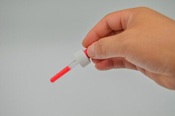 hand holding syringe