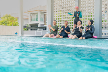 A group of seniors enjoys a lively water exercise class, led by an instructor at a poolside. They splash, laugh, and engage in fun activities, staying active and promoting health and wellness.