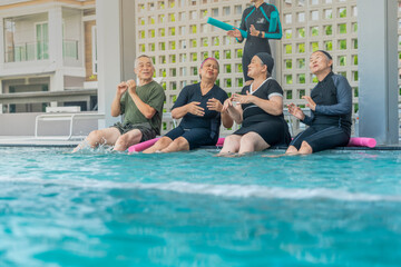 A group of seniors enjoys a lively water exercise class, led by an instructor at a poolside. They splash, laugh, and engage in fun activities, staying active and promoting health and wellness.