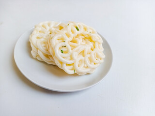 Kerupuk ikan putih or kerupuk warung is Indonesian traditional deep fried cracker made from starch mixed with fish flavoring