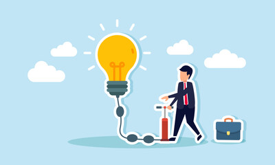 A businessman pumps up a light bulb, illustrating a trigger for brainstorming innovation and new ideas