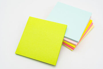 Stack empty sticky post note paper sheet on white background. sticky notes paper with shadow. copy space.