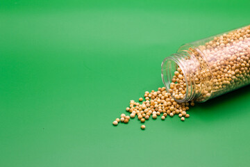 Pile of dried coriander seeds. A Close-up background texture of dried coriander seeds