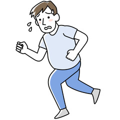 辛そうにランニングする男性