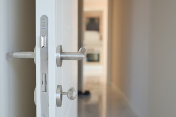 open door concept with Door handle and blur interior room background,