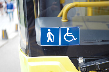 Enhancing accessibility with yellow checkerboard symbols for public transportation icon display