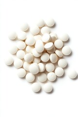 Pile of white round pills