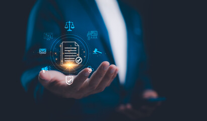 Compliance in business to laws and regulations, ethical operations. businessman hand holding...