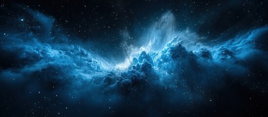 Fototapeta premium A cosmic nebula of blue gas clouds in space, with stars twinkling in the background.