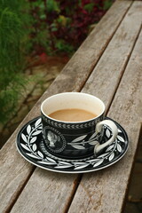 A Mug of Coffee on a Wooden Table
