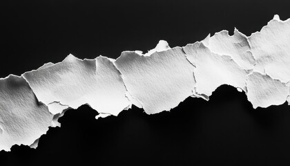Ripped White Paper Against a Black Background