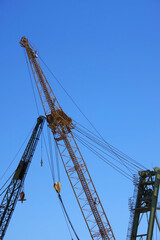 Cranes and huge metal structures at an old defunct shipyard