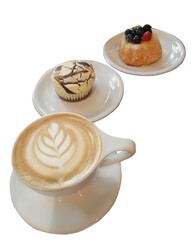 A coffee with pictures of white leaves