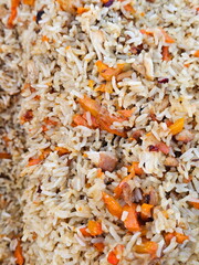 Uzbek pilaf in a cauldron