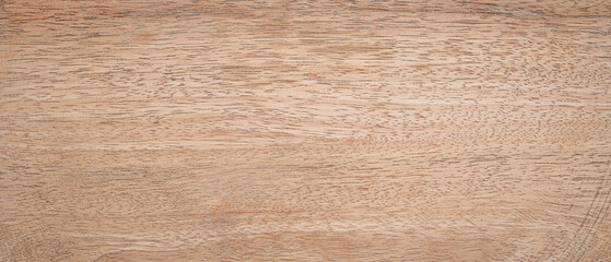 Natural mango wood texture with fine grains and warm tones.