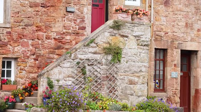 Charming Stone House with Flowers