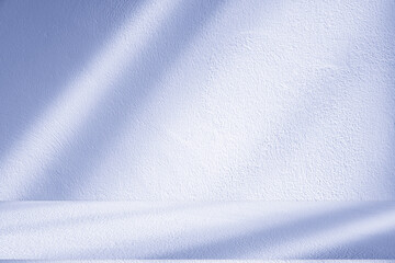 Obraz premium Wall interior background, studio and backdrops show products. with soft light shadow from window color blue and white. background for text insertion and presentation of product 