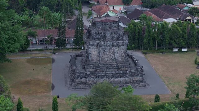 Aerial view of temple made of stone. Buddhist temple of Mendut located in Magelang, Central Java, Indonesia.