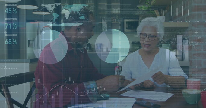 Image of data processing over diverse senior couple holding documents