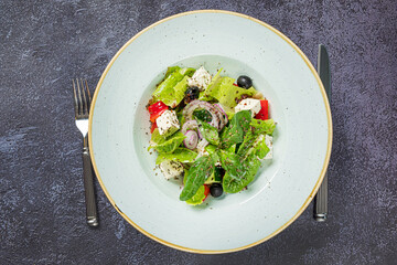 greek salad in the white plate
