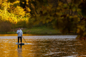 Paddleboarding in Autumn Serenity