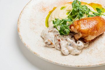 chicken with mashed potato and salad
