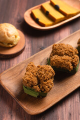 Bolu kukus gula merah (brown sugar steamed sponge cake). with copy space. perfect for recipe, article, catalogue, or any commercial purposes.