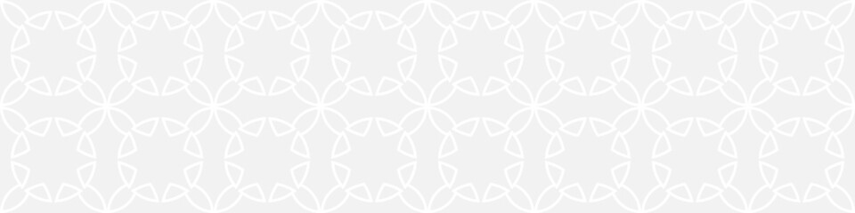 Seamless trendy pattern of stripes and diamonds, geometric white shapes for textiles and wallpaper. Abstract panoramic pattern on a gray background for a New Year or wedding cover or card.