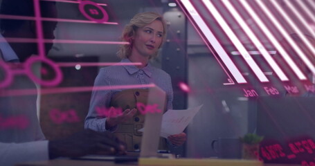 Image of data processing and diagrams over diverse colleagues discussing work