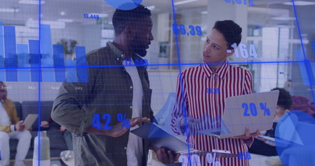 Image of data processing and diagrams over diverse colleagues discussing work