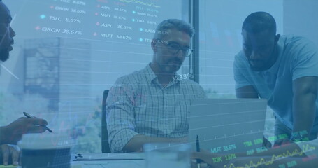 Image of financial data processing over diverse business people using laptop