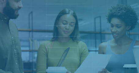 Image of financial data processing over diverse business people in office